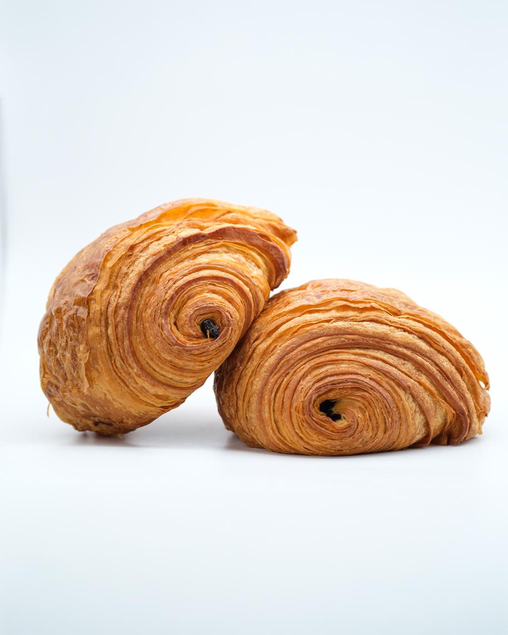Two croissants with chocolate inside